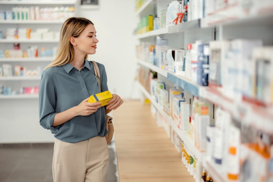 A woman in New Jersey shops for over the counter ear drops to relieve minor pain.